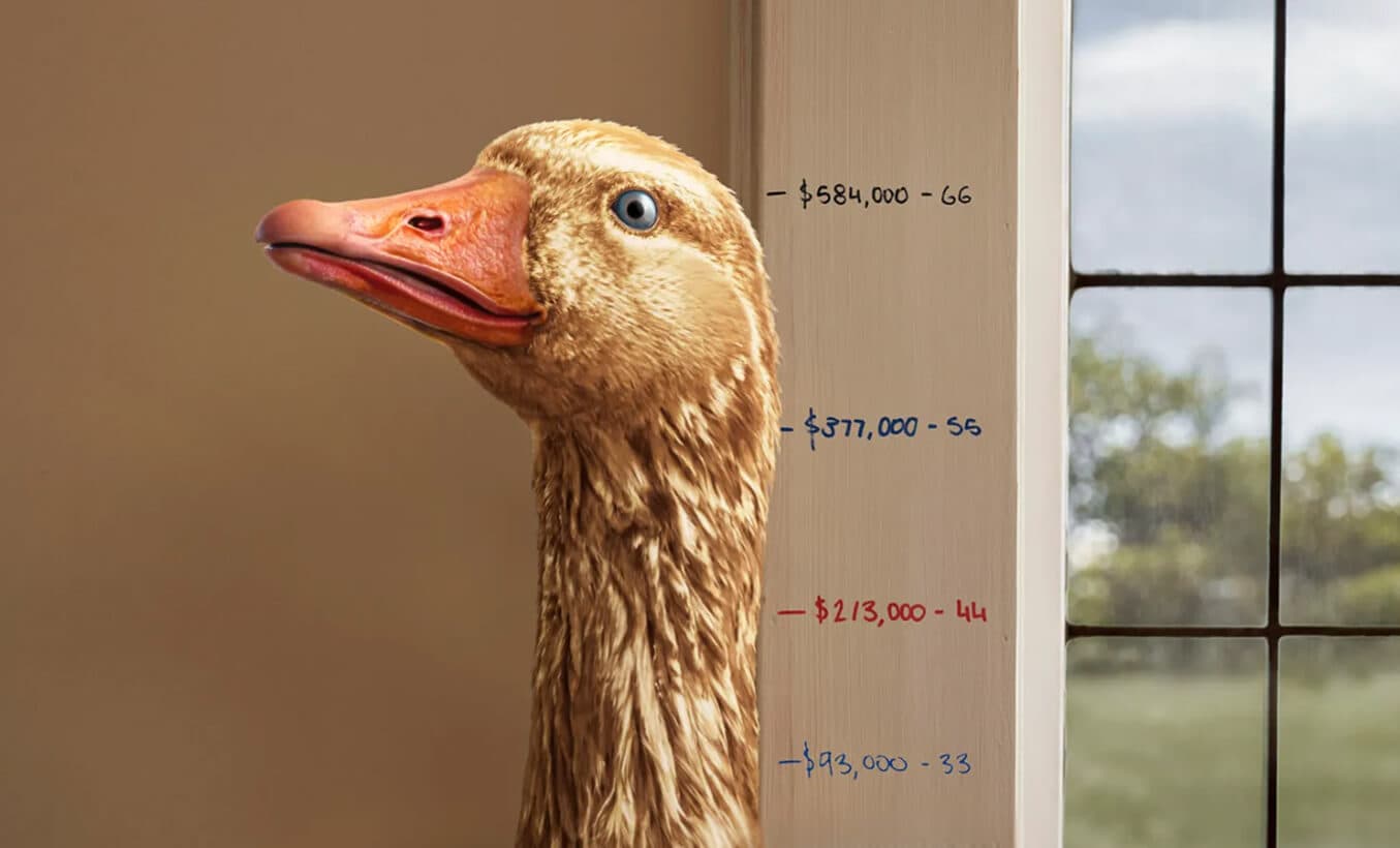 A goose measured against a height chart marked with retirement savings milestones